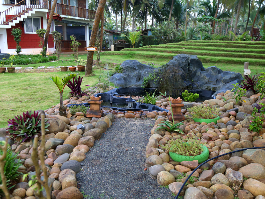 Rock with waterfall at cheshire beach cottage